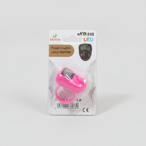 A hand holding a packaged pink LED finger counter. The product is in its original blister card packaging with a white background, featuring a small LCD display and the text 'eNO.